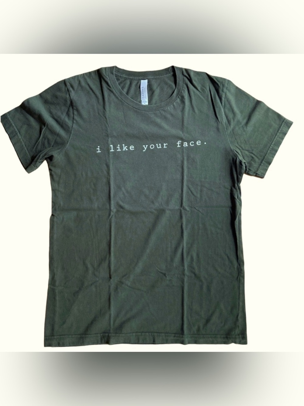 Canvas Belle-Canvas USA Strong Forest Green Medium “i like your face” T-shirt